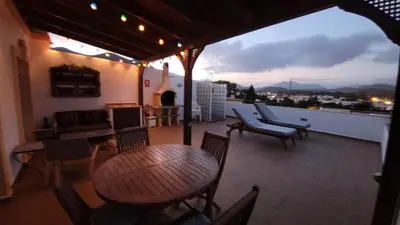 Un balcón o terraza de Atico centrico con terraza vistas mar y montaña