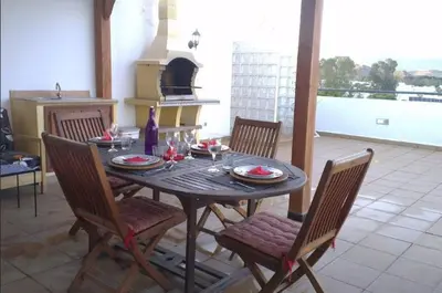 Un balcón o terraza de Atico centrico con terraza vistas mar y montaña