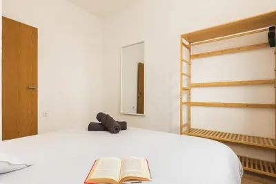 Cama o camas de una habitación en Gran Capitán- Casa en el centro con 3 habitaciones y terraza