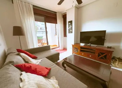 Una televisión o centro de entretenimiento en Apartment with Private Terrace in Vera Playa