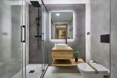 Un baño de Apartamentos Paseo Maritimo by Expoholidays 5 y 9