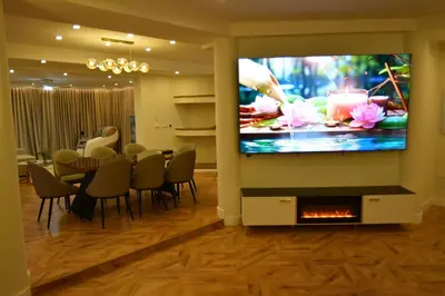 Una televisión o centro de entretenimiento en Resort Villa Las Palmeras