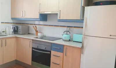 Una cocina o zona de cocina en Naturist friendly Apartment Vera Playa