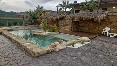Piscina en o cerca de Villa Loma de Bas 1 y 2