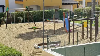 Zona de juegos infantil en Beachside Living Stunning Pool - Puerto Rey