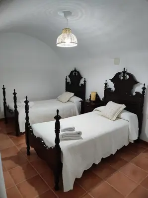 Cama o camas de una habitación en El refugio de Águeda