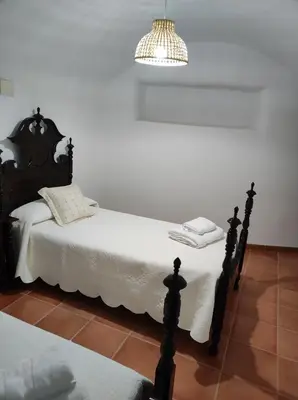 Cama o camas de una habitación en El refugio de Águeda