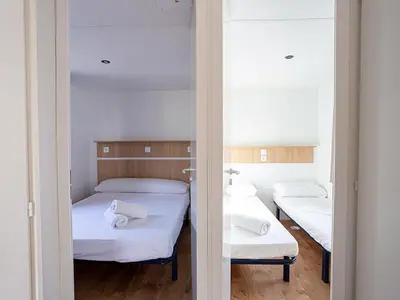 Cama o camas de una habitación en Mobil Home Familial avec Terrasse - Camping Los Escullos - API-1-52-1781