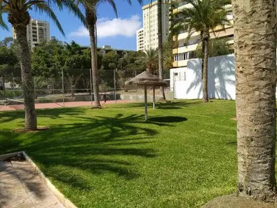 Jardín al aire libre en Estudio Paraíso piscina y playa