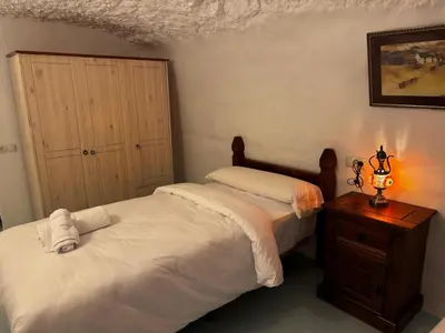Cama o camas de una habitación en Cuevas La Veranda Orce