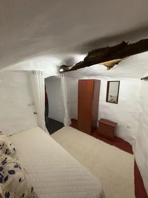 Cama o camas de una habitación en Casa Cueva Conde