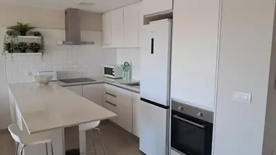 Una cocina o zona de cocina en Magna Brisa - Piso Vera Playa