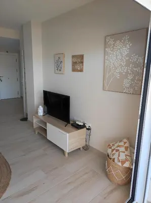 Una televisión o centro de entretenimiento en Magna Brisa - Piso Vera Playa