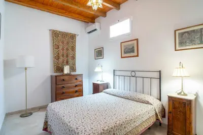 Cama o camas de una habitación en Olivo, Finca del Alamo