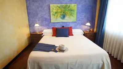 Cama o camas de una habitación en Hotel Tikar