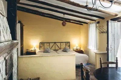 Cama o camas de una habitación en Casas Cueva Tio Tobas Guadix