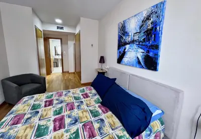 Cama o camas de una habitación en Apartamentos Arcos Duplex Águilas