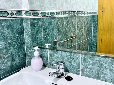 Un baño de Apartamentos Arcos Duplex Águilas