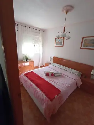 Cama o camas de una habitación en Apartamento Merlin