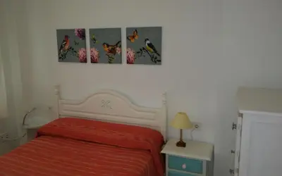 Cama o camas de una habitación en Apartamento Los Flamencos