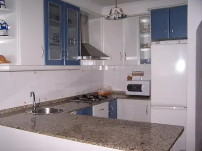 Una cocina o zona de cocina en Apartamento Trini