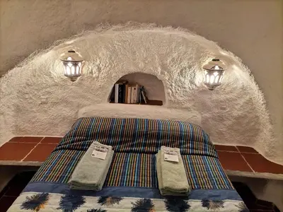 Cama o camas de una habitación en Casa Cueva Guadix