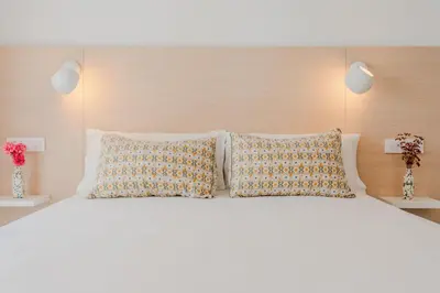 Cama o camas de una habitación en Hostal La Isla