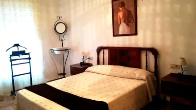 Cama o camas de una habitación en Cueva El Murallon Benamaurel