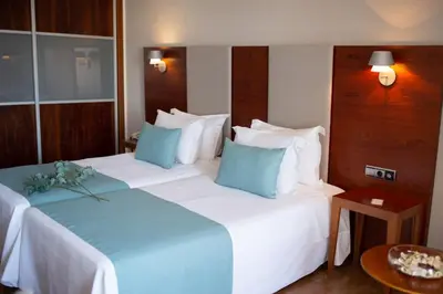 Cama o camas de una habitación en Hotel El Trebol