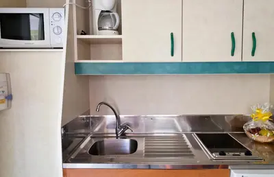 Una cocina o zona de cocina en Complejo Turístico Los Escullos Cabo de Gata