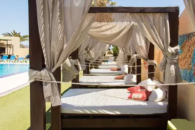Cama o camas de una habitación en Complejo Turístico Los Escullos Cabo de Gata
