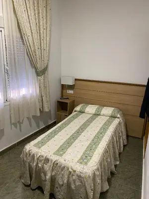Cama o camas de una habitación en La Escapada