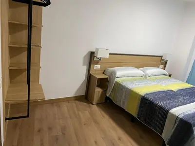 Cama o camas de una habitación en La Escapada