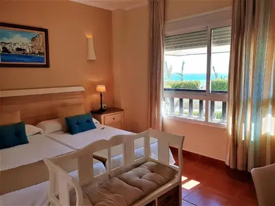Cama o camas de una habitación en Hotel las Calas