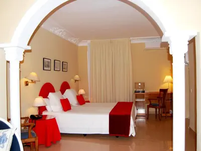 Cama o camas de una habitación en Hotel El Dorado
