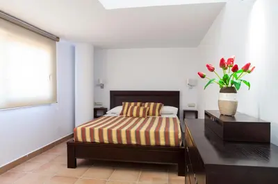 Cama o camas de una habitación en Apartamentos Mexico