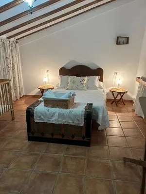 Cama o camas de una habitación en La Cueva