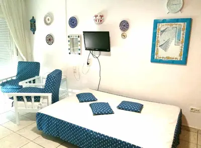 Cama o camas de una habitación en Estudio Frente Al Mar