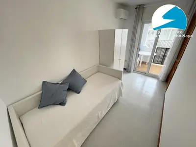 Cama o camas de una habitación en La Puntica Carboplaya