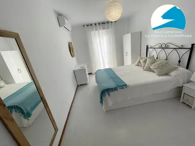 Cama o camas de una habitación en La Puntica Carboplaya