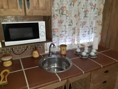 Una cocina o zona de cocina en Cueva El Jaraiz