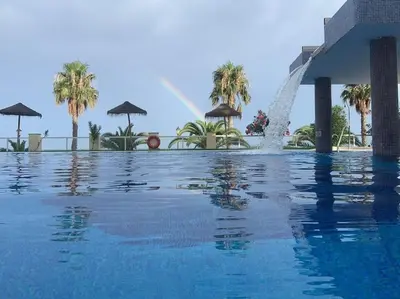 Piscina en o cerca de Primera Linea De Playa