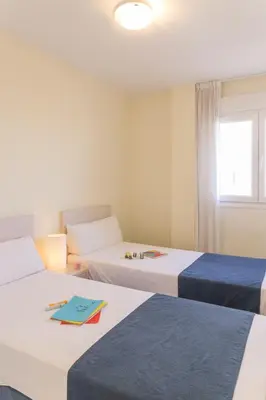 Cama o camas de una habitación en Pierre & Vacances Almeria Roquetas de Mar
