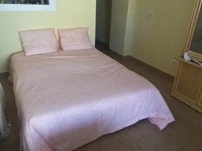 Cama o camas de una habitación en Arabella Naturist Apartment