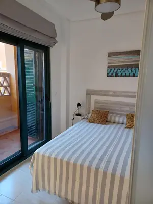 Cama o camas de una habitación en Vera Playa Naturista Michel