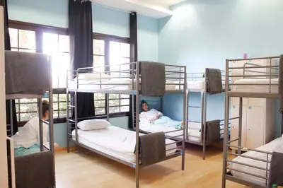 Cama o camas de una habitación en Hostel Águilas Isla del Fraile