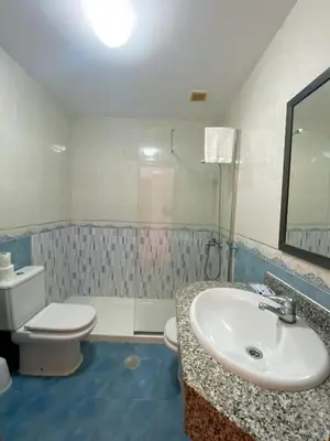 Un baño de Apartamentos Maracay