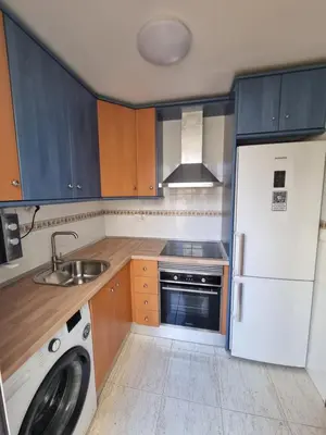 Una cocina o zona de cocina en casa luxury nudista