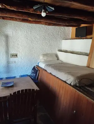 Cama o camas de una habitación en Camping Trevélez