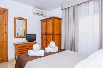 Cama o camas de una habitación en Miramar